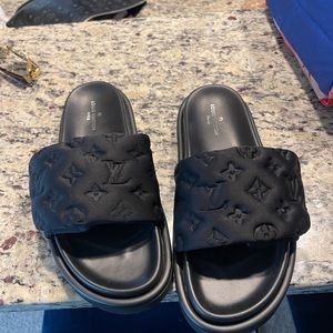 Louis Vuitton black slide. Worn a few times.